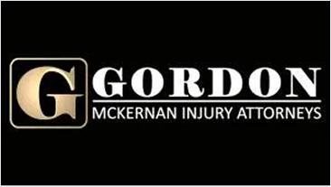 Gordon McKernan Injury Attorneys logo featuring a large gold "G" and white text on a black background.