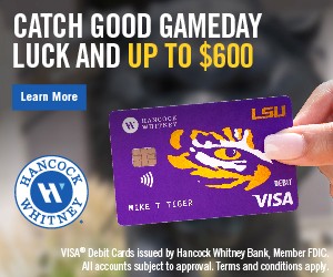 A hand holds an LSU Hancock Whitney VISA debit card. Text advertises a chance to get up to $600, with a "Learn More" button below.