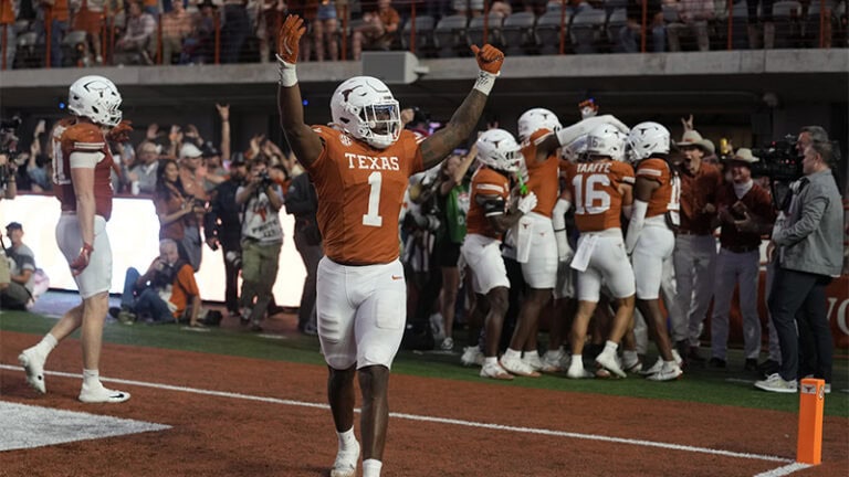 Texas Longhorns football player celebrates a touchdown, highlighting the team’s strong SEC offense for 2026.