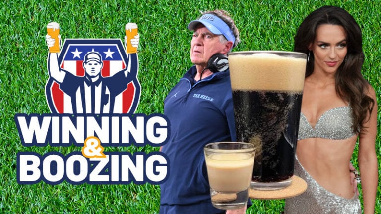 A man in sportswear and a woman in silver toast drinks, celebrating on a lush green lawn.